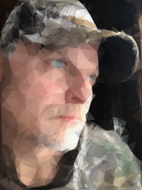 a man wearing a camouflage hat